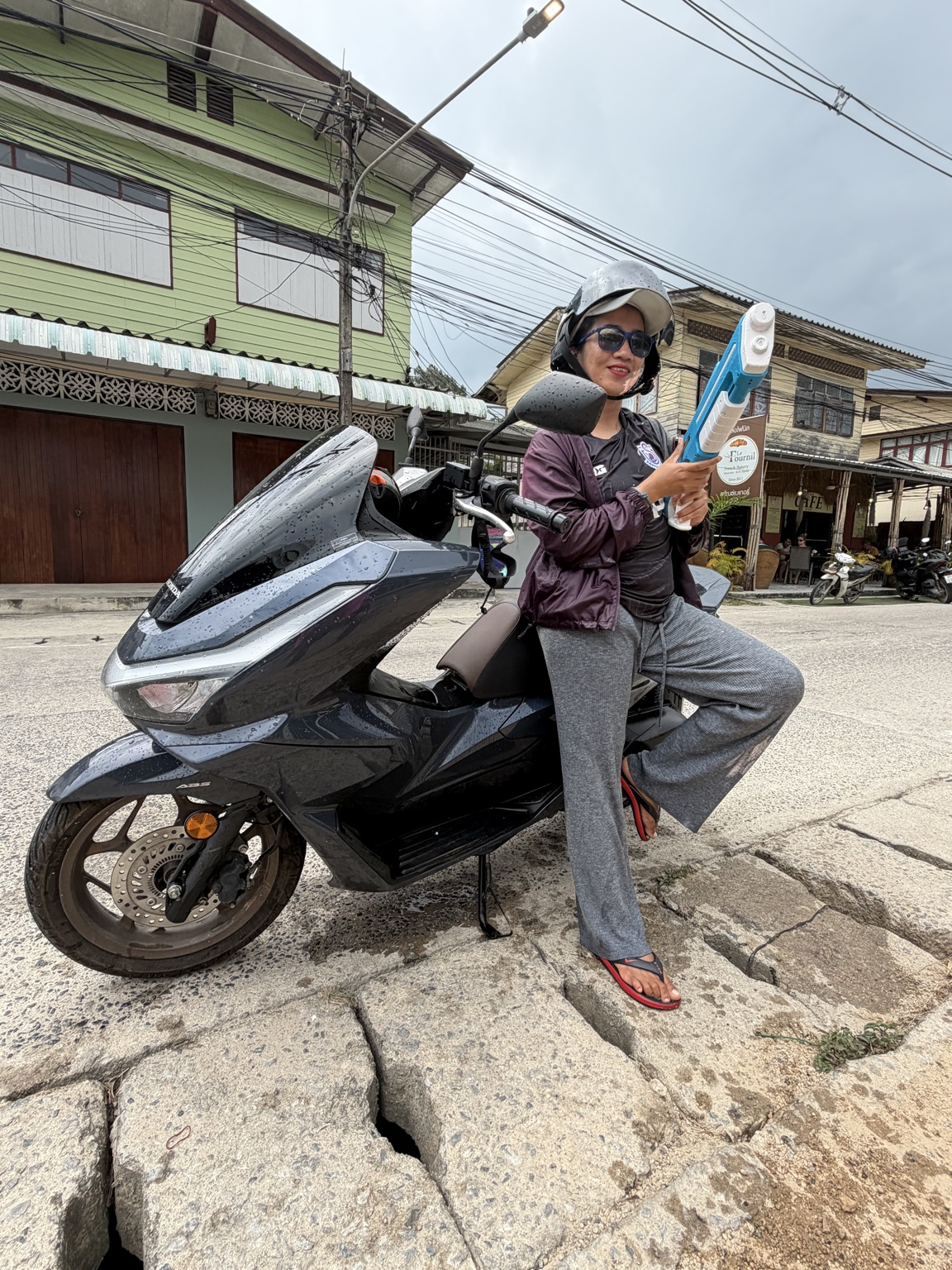 Scooter rider exploring Koh Samui